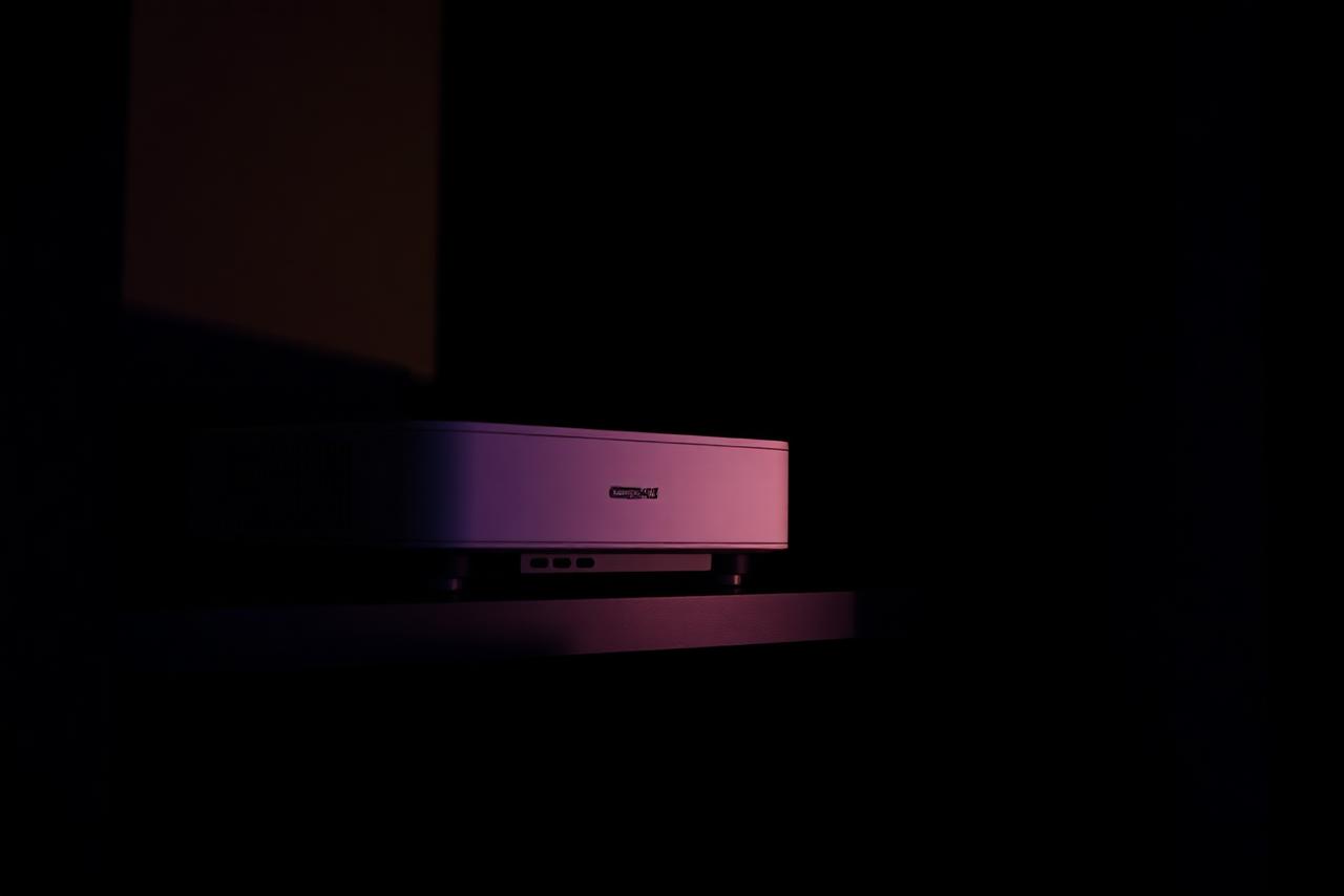 Home cinema projector in a dark room as an investigation subject